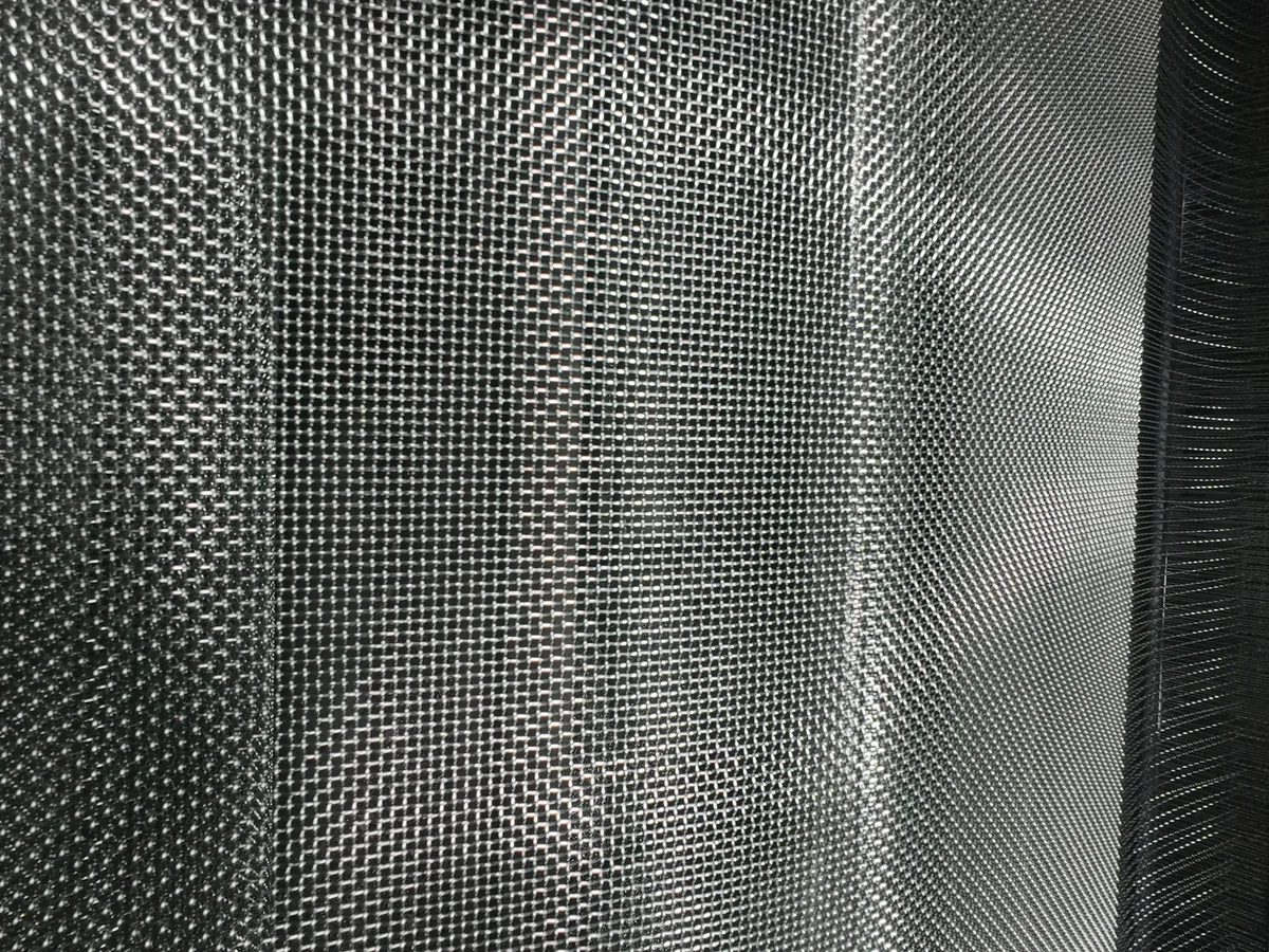 Stack of crimped wire mesh panels ready for export packing