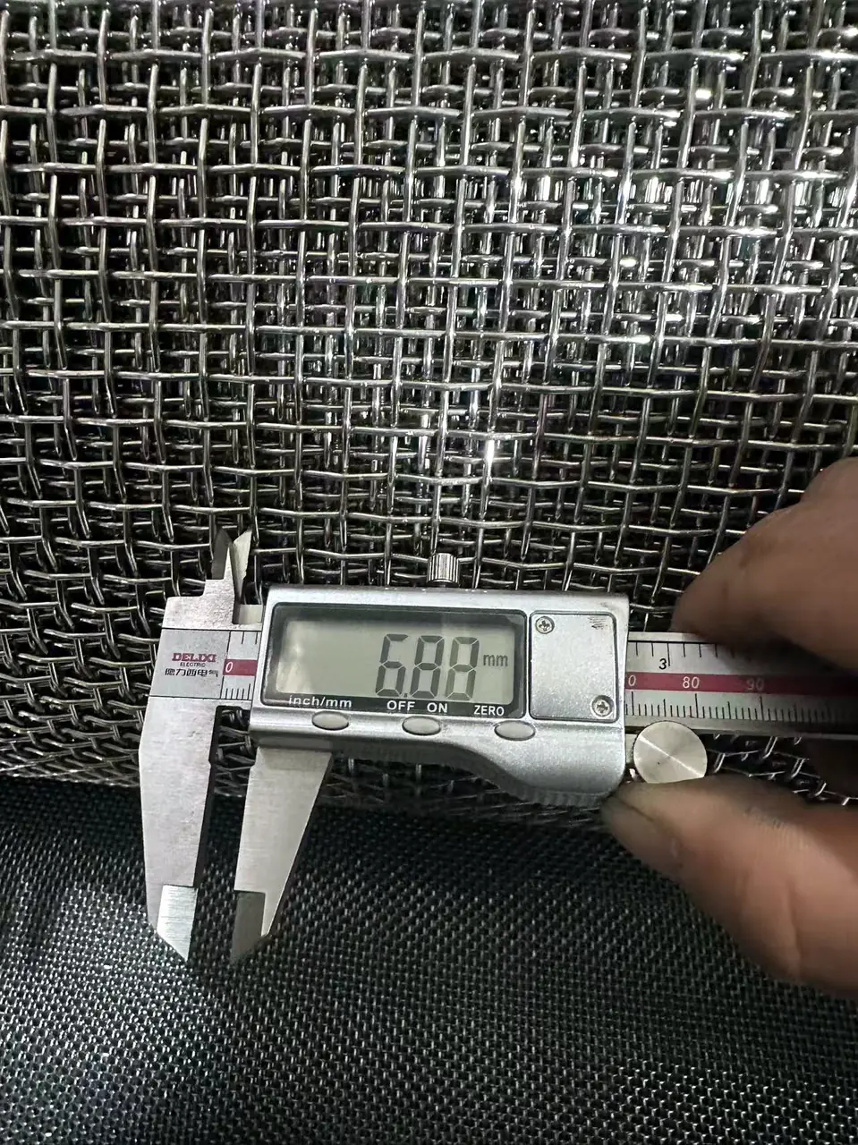 Aperture and wire diameter measurement on stainless steel crimped wire mesh per AS 4773 mesh size verification, Anping Hand in Hand QC bench