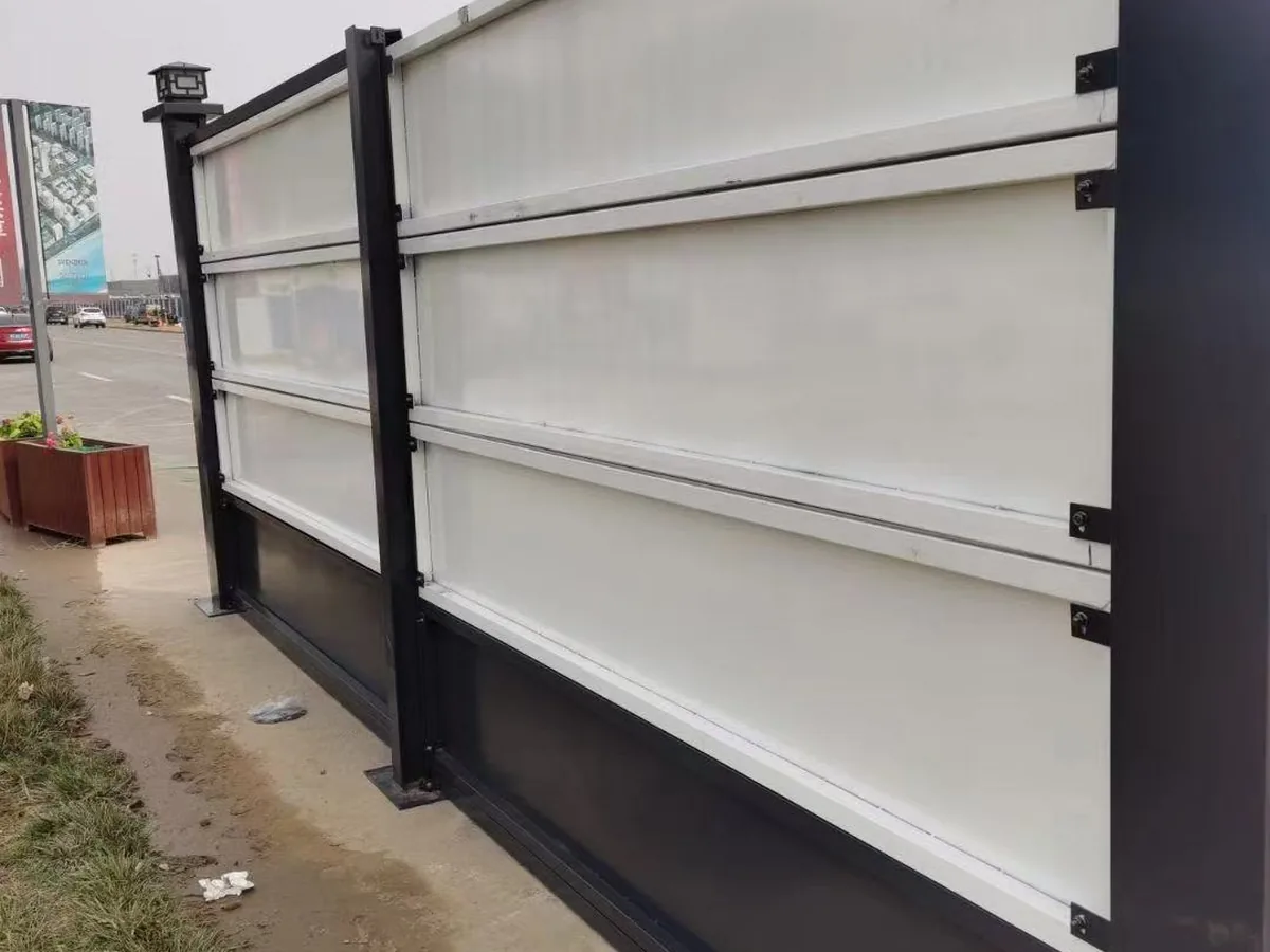 Temporary fence concrete base block and coupling clamp connecting two welded mesh panels