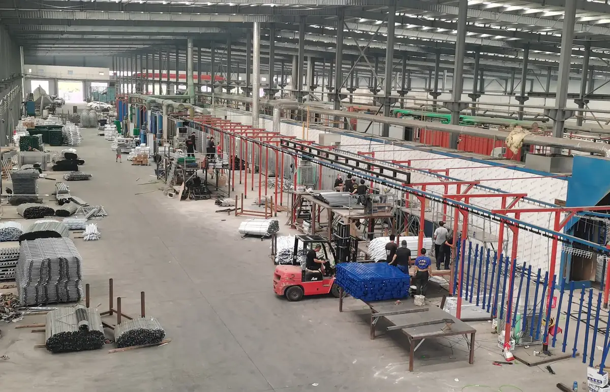 Wire mesh production workshop with welding lines at Anping Hand in Hand factory