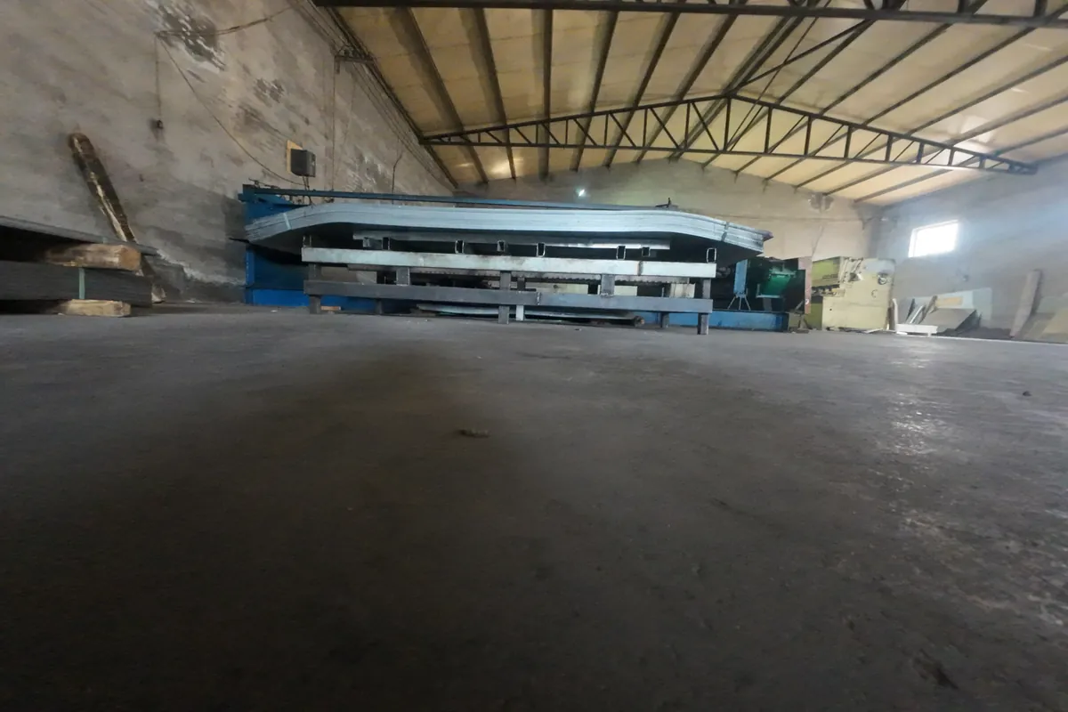 Perforated metal sheet outdoor staging area - container loading preparation