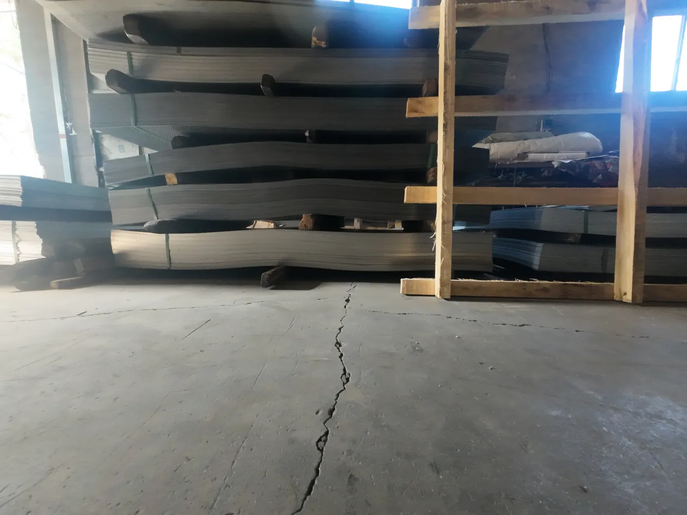 Delivery and Docs - Container loading aerial view at Anping factory with B/L, packing list, COA and mill certificate provided.