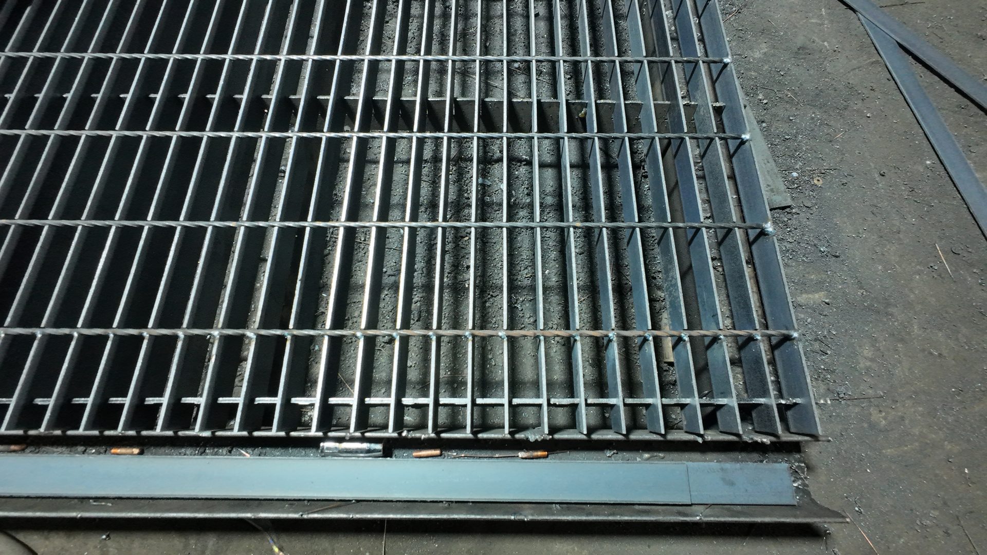 Anping Hand in Hand steel grating factory aerial drone view finished panel stack yard ready for export